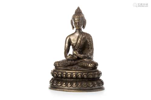 A CHINESE SILVERED BRONZE FIGURE OF A SEATED BUDDHA