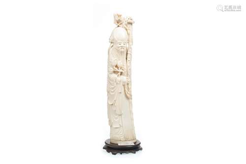 A LATE 19TH CENTURY CHINESE CARVED IVORY FIGURE OF SHOU LAO