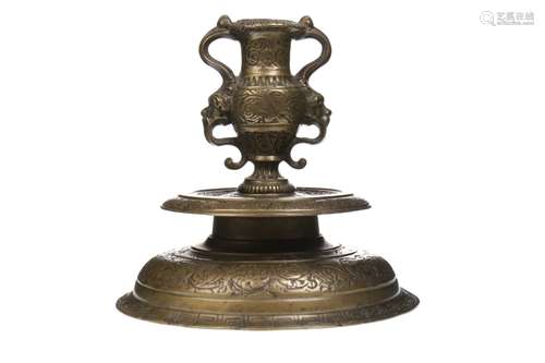 A VENETIAN (VENETO) ISLAMIC BRASS CANDLESTICK