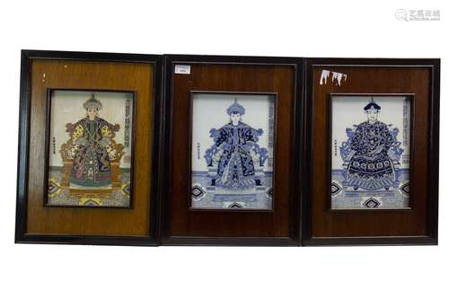 A SET OF THREE CHINESE CERAMIC PANELS OF QING EMPERORS