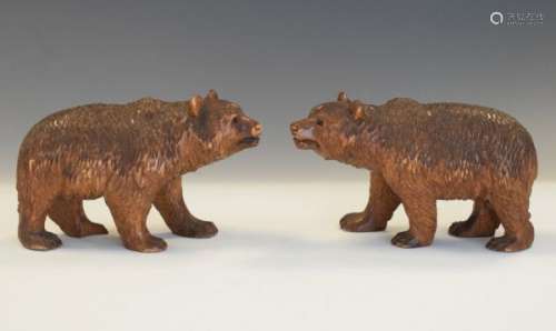 Two early 20th Century Black Forest carved softwood models of standing bears, each 15cm long x 9cm
