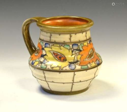 Charlotte Rhead for Crown Ducal jug having band of tube lined floral decoration, the base with