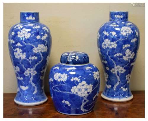 Pair of Chinese blue and white baluster shaped vases having hand painted prunus decoration, each