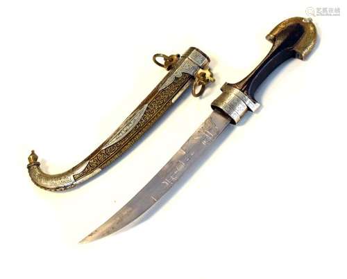 20th Century Middle Eastern curved dagger with decorative white metal and brass scabbard with wooden