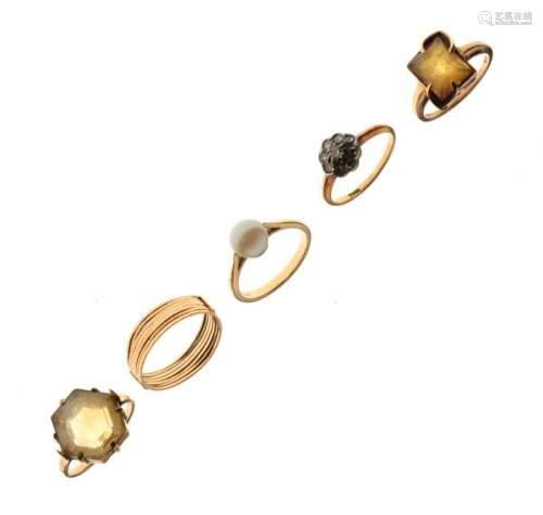 Five assorted yellow metal rings comprising: one stamped 18ct, two 9ct, the others unmarked, 13g