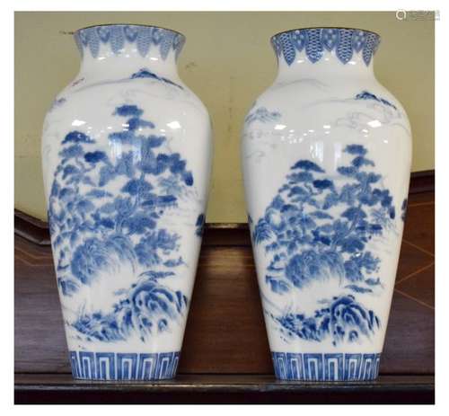 Pair of Japanese Shibata blue and white decorated baluster shaped vases having landscape decoration,