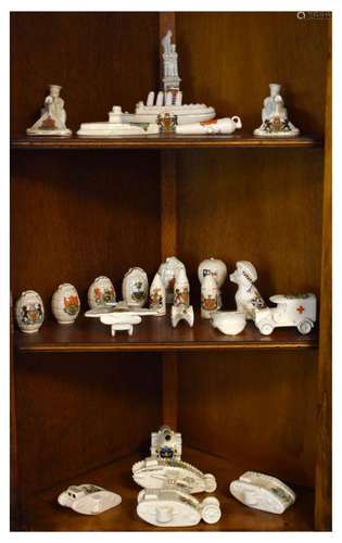 Crested china - Quantity of military shapes including; First World War Tanks, hand grenades etc, all