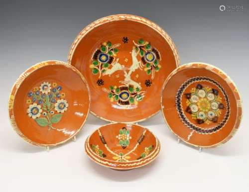 Group of 19th Century Continental tin glazed bowls probably German or Swiss, the largest decorated