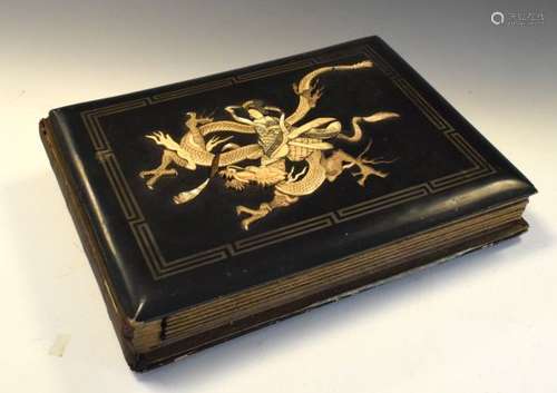 Early 20th Century Japanese ivory-mounted ebonised photograph album, the cover decorated with a