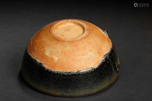 A BROWN GLAZED PORCELAIN BOWL