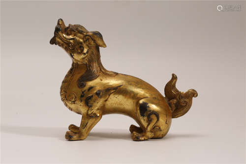 A Chinese Gilt Bronze Foo-Dog