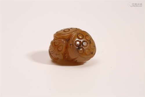 A Chinese Carved Agate Frog and Lotus Pendant