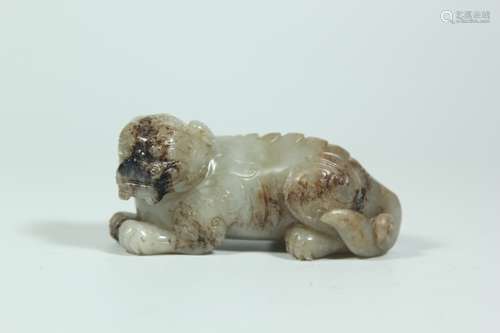 A Chinese Carved Jade Foo-Dog