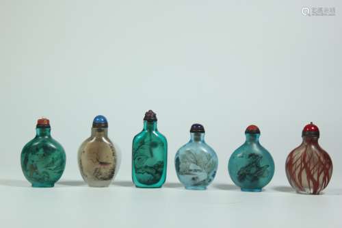 A Group of Six Chinese Carved Peking Glass Snuff Bottle