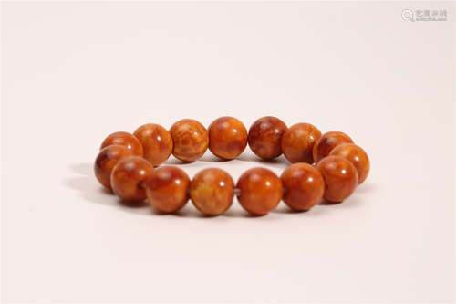 A Chinese Carved Amber Bracelet