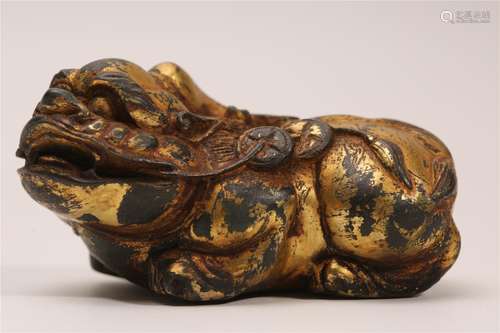 A Chinese Gilt Bronze Foo-Dog