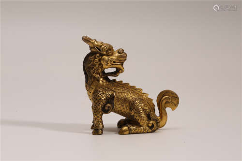 A Chinese Gilt Bronze Foo-Dog