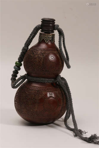 A Chinese Carved Double Gourd