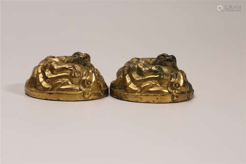 A Pair of Chinese Gilt Bronze Paper Weight