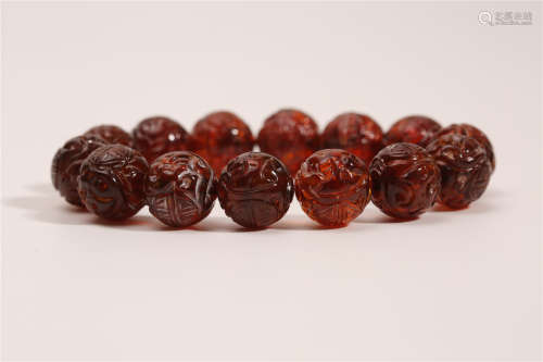 A Chinese Carved Amber Bracelet