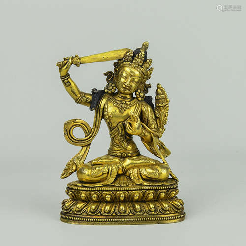 A Chinese Gilt Bronze Buddha