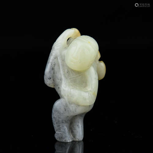 A Chinese Carved Jade Figure of A Boy