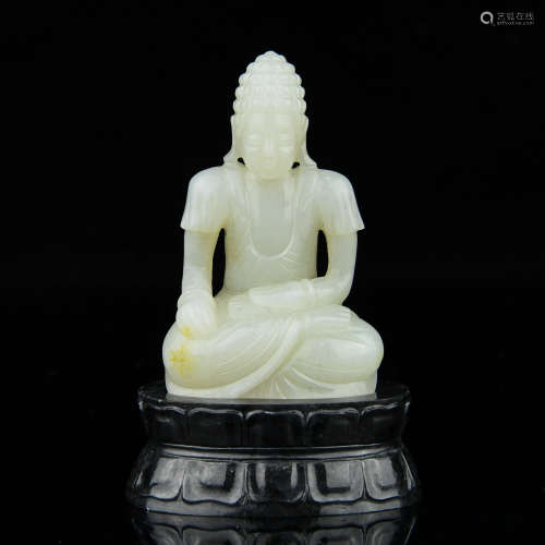 A Chinese Carved Jade Buddha with Stand