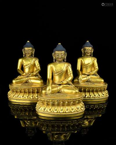 A Set of Three Chinese Gilt Bronze Buddha