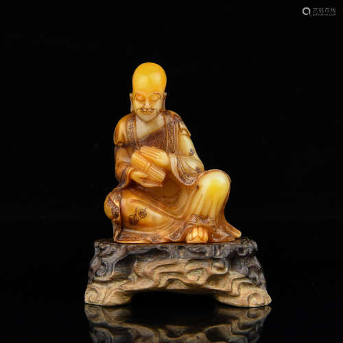 A Chinese Carved Shoushan Figure with Stand