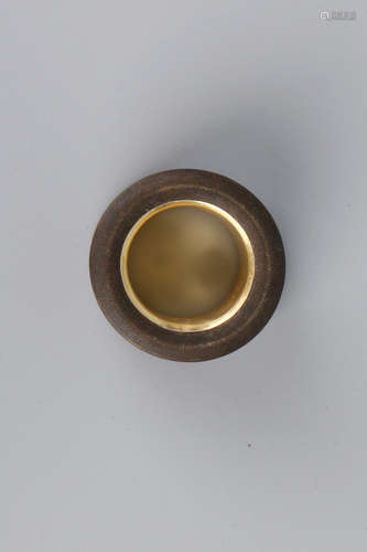 A Chinese Carved Agar-Wood Inlaid Gilt Bronze Ring