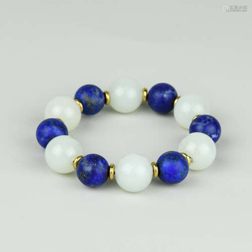 A Chinese Carved Jade and Lapis Lazuli Bracelet