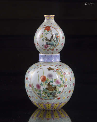 A Chinese famille rose double gourd vase