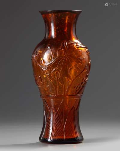 A Chinese gold-flecked translucent brown glass vase