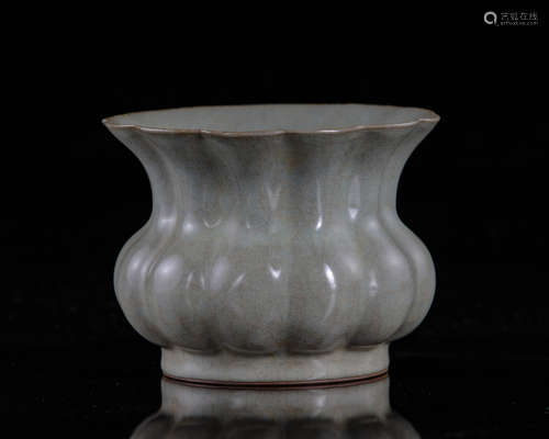 A Chinese celadon-crackle-glazed foliate spittoon, zhadou