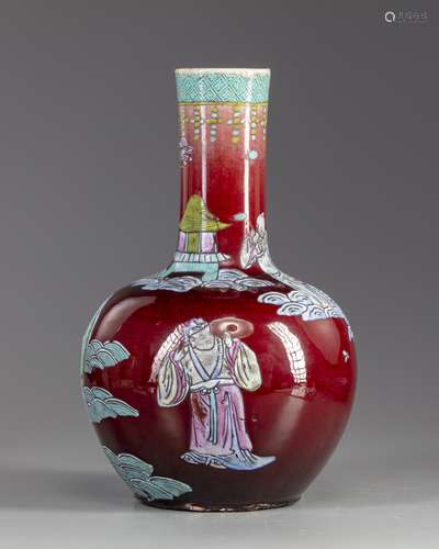 A Chinese famille rose red glazed bottle vase