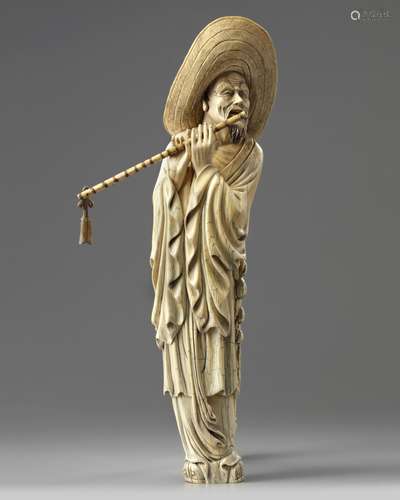 A Chinese carved ivory musician