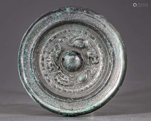 A Chinese bronze scholar mirror