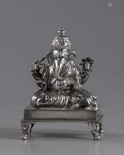 A silver figure of Ganesha