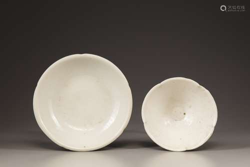 A Chinese white-glazed bowl and plate