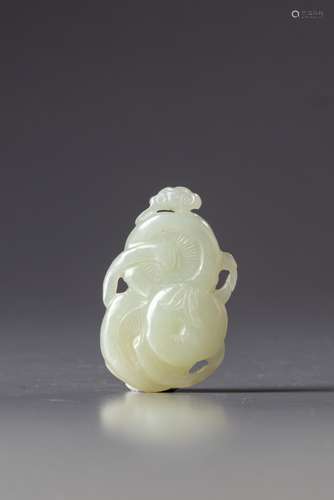 A Chinese white jade 'persimmon and dragonfly' carving