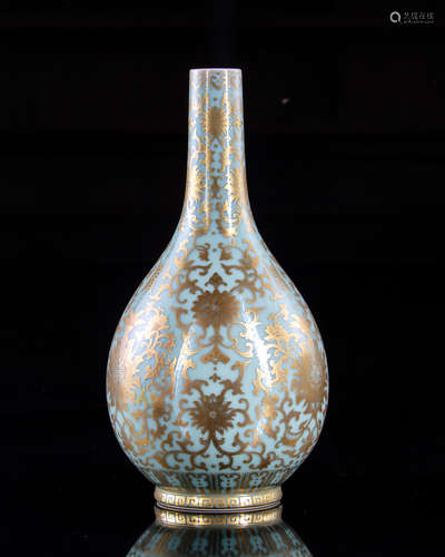 A Chinese celadon-ground gilt-decorated bottle vase