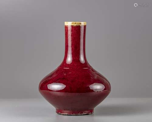 A Chinese= red glazed bottle vase