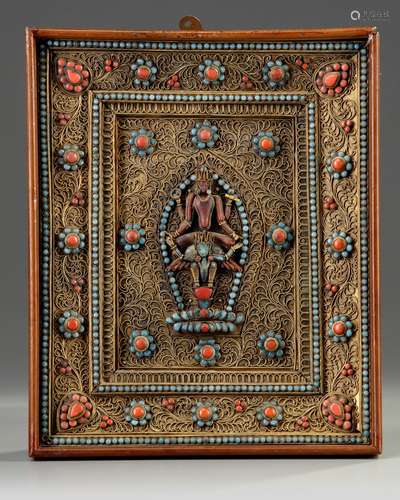 A Nepalese gilt filigree coral and turquoise-inlaid panel