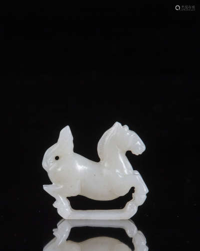 A Chinese pale jade carving of a horse