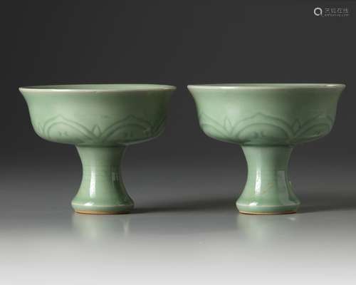 A pair of Chinese celadon-glazed stem cups