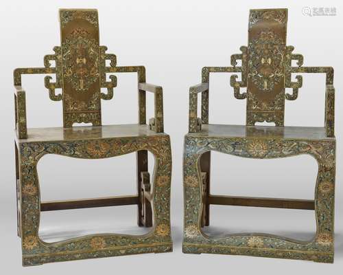 A pair of Chinese polychrome lacquered and gilt and arm chairs