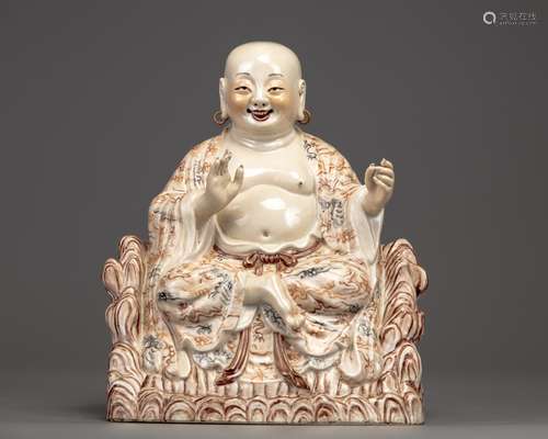 A Chinese enamelled figure of Hesheng Budai