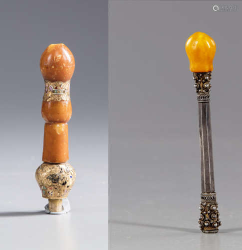 Two amber mouthpieces of a pipe