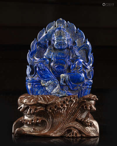 A Chinese lapis lazuli figure of Jambhala.