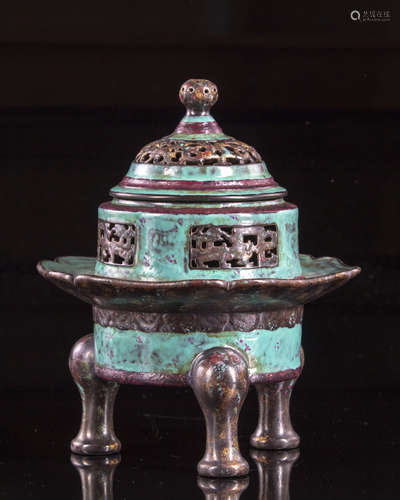 A Chinese bronze tripod censer